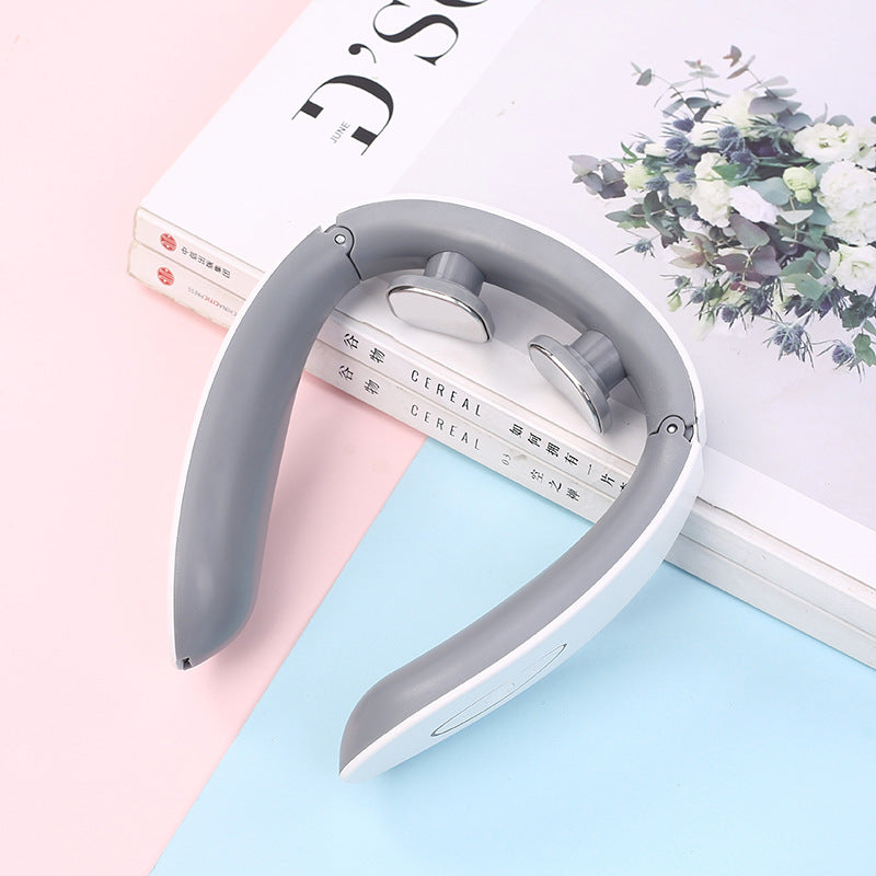 Masajeador cervical port�til con calor y electroterapia