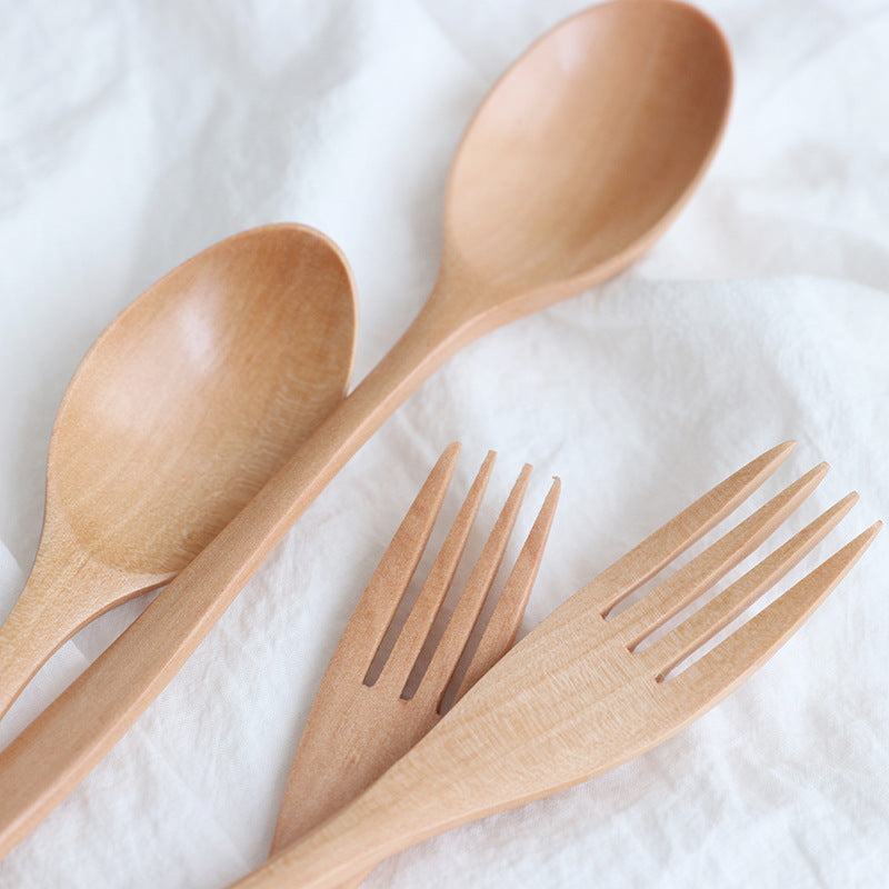 Juego de cuchara y tenedor de madera con mango ondulado